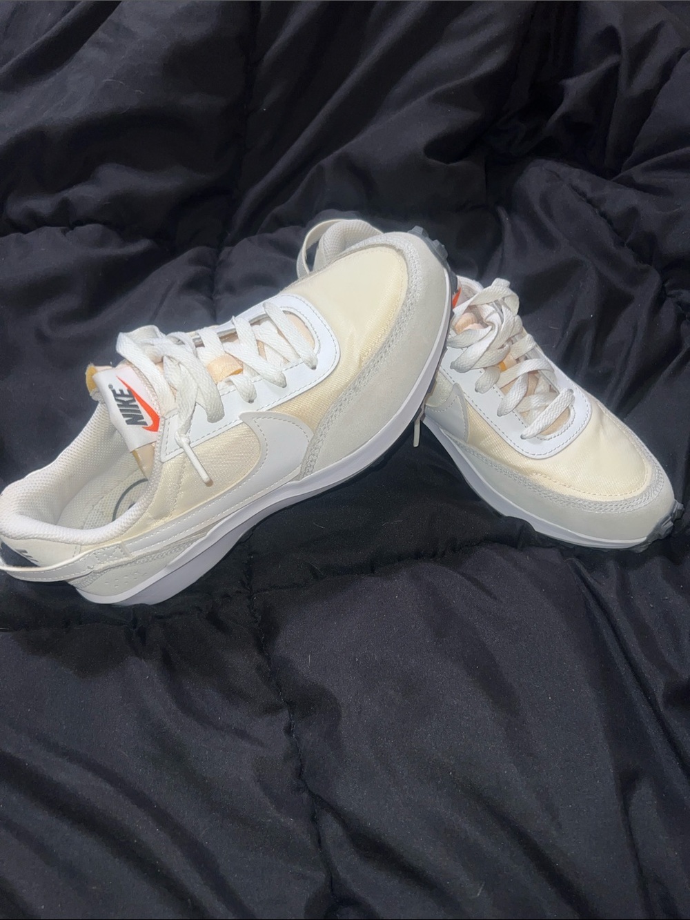 Nike Women’s Retro Runner Sneakers in Cream and White with Orange Accent